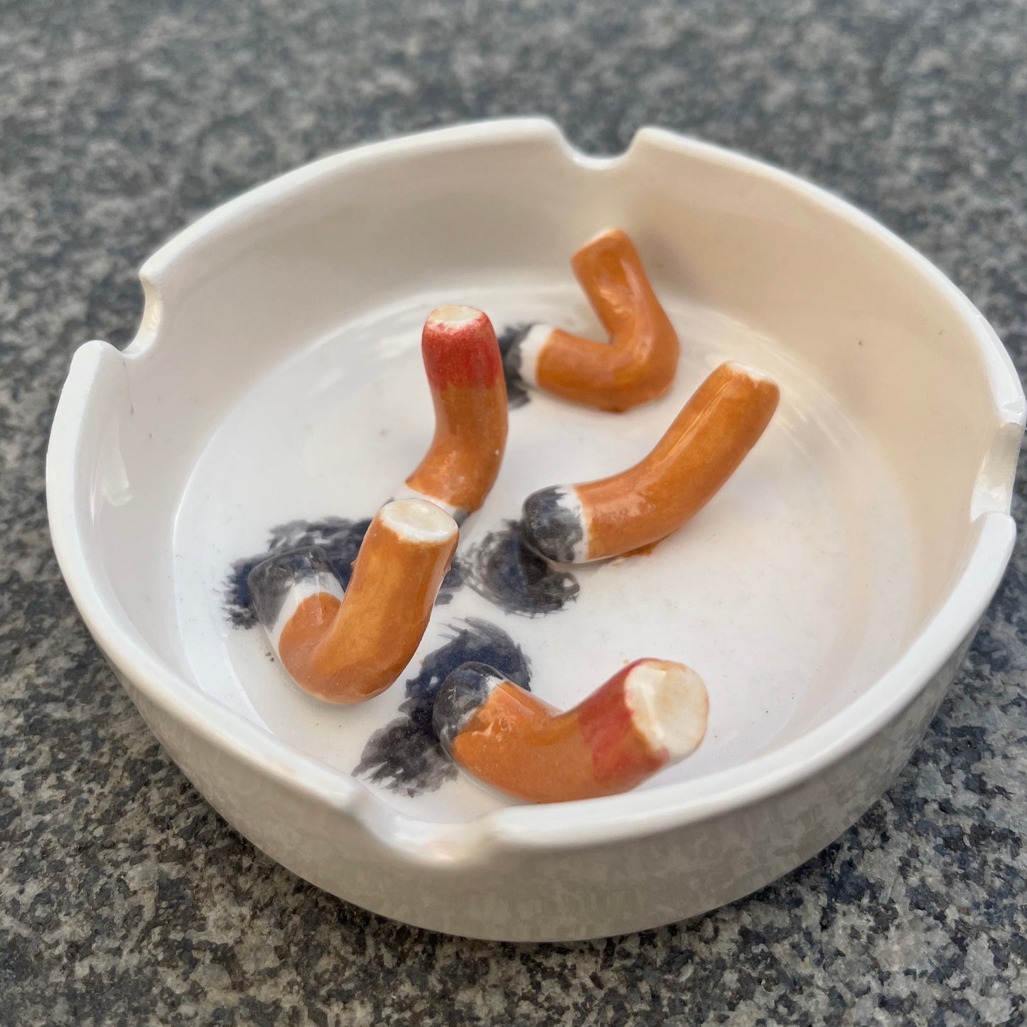 Ashtray/accessory holder full of cigarettes #3