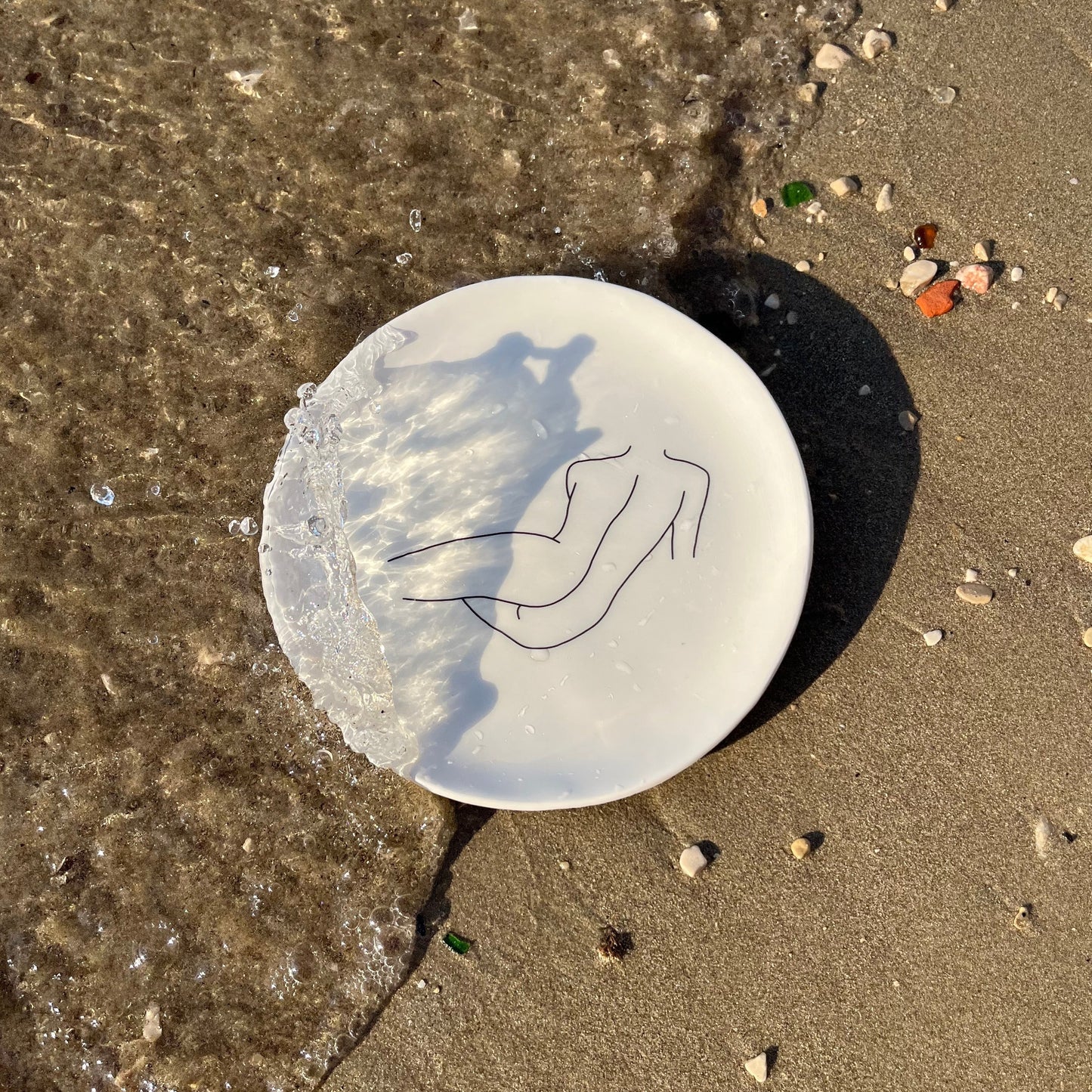 Ceramic plate "Laying body"