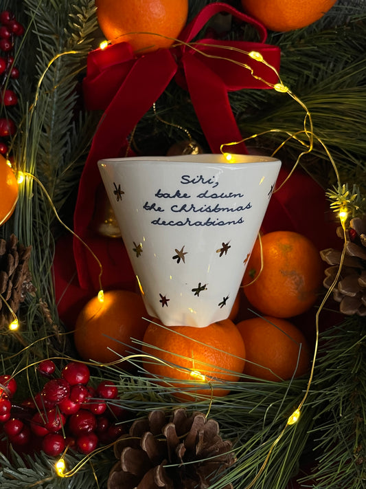 Cup Siri take down Xmas decorations