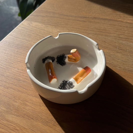 Ashtray/accessory holder full of cigarettes #5