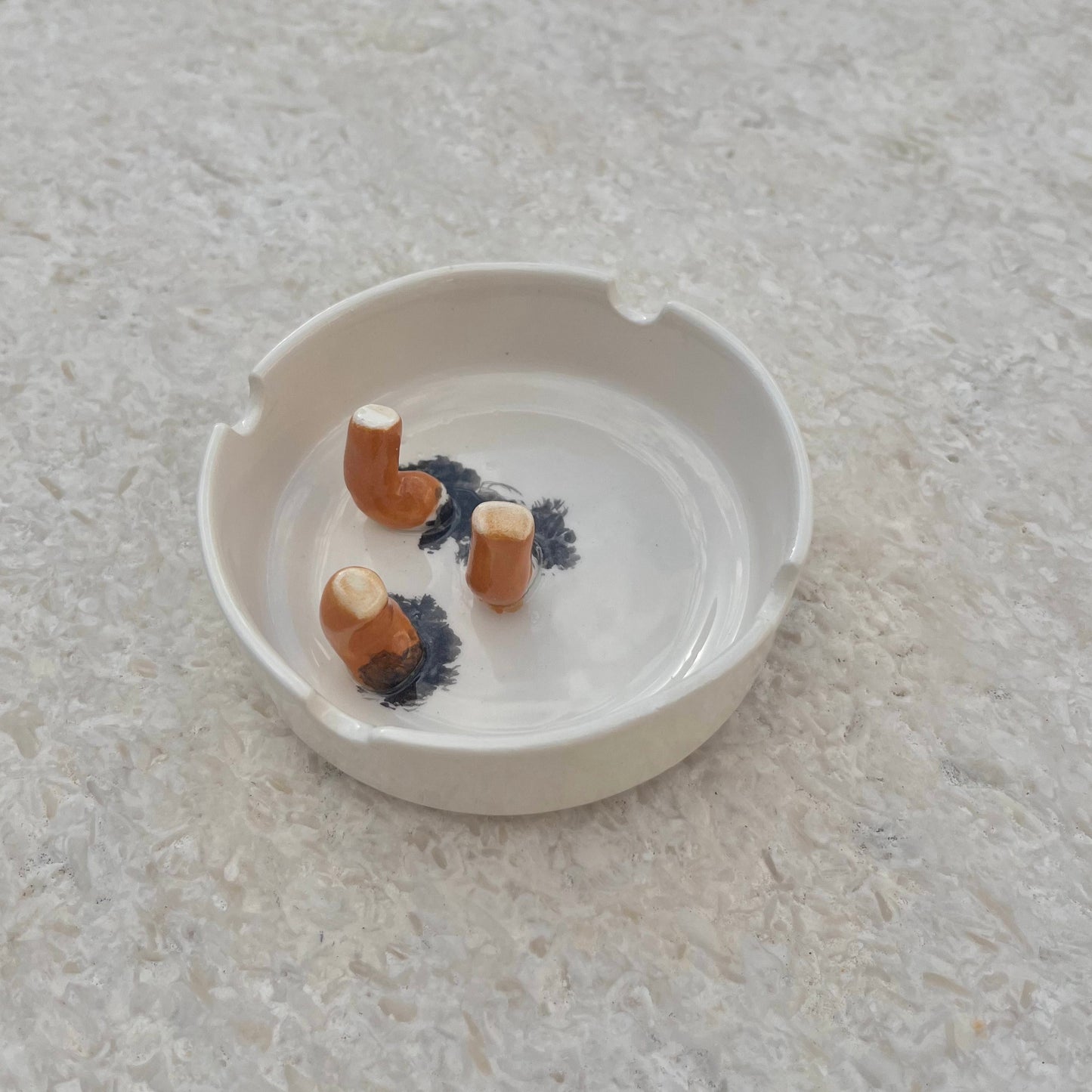 Ashtray/accessory holder full of cigarettes #1