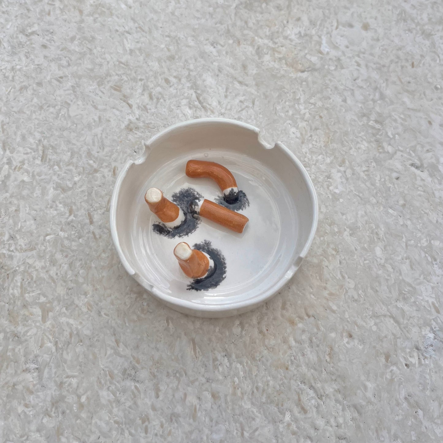 Ashtray/accessory holder full of cigarettes #2
