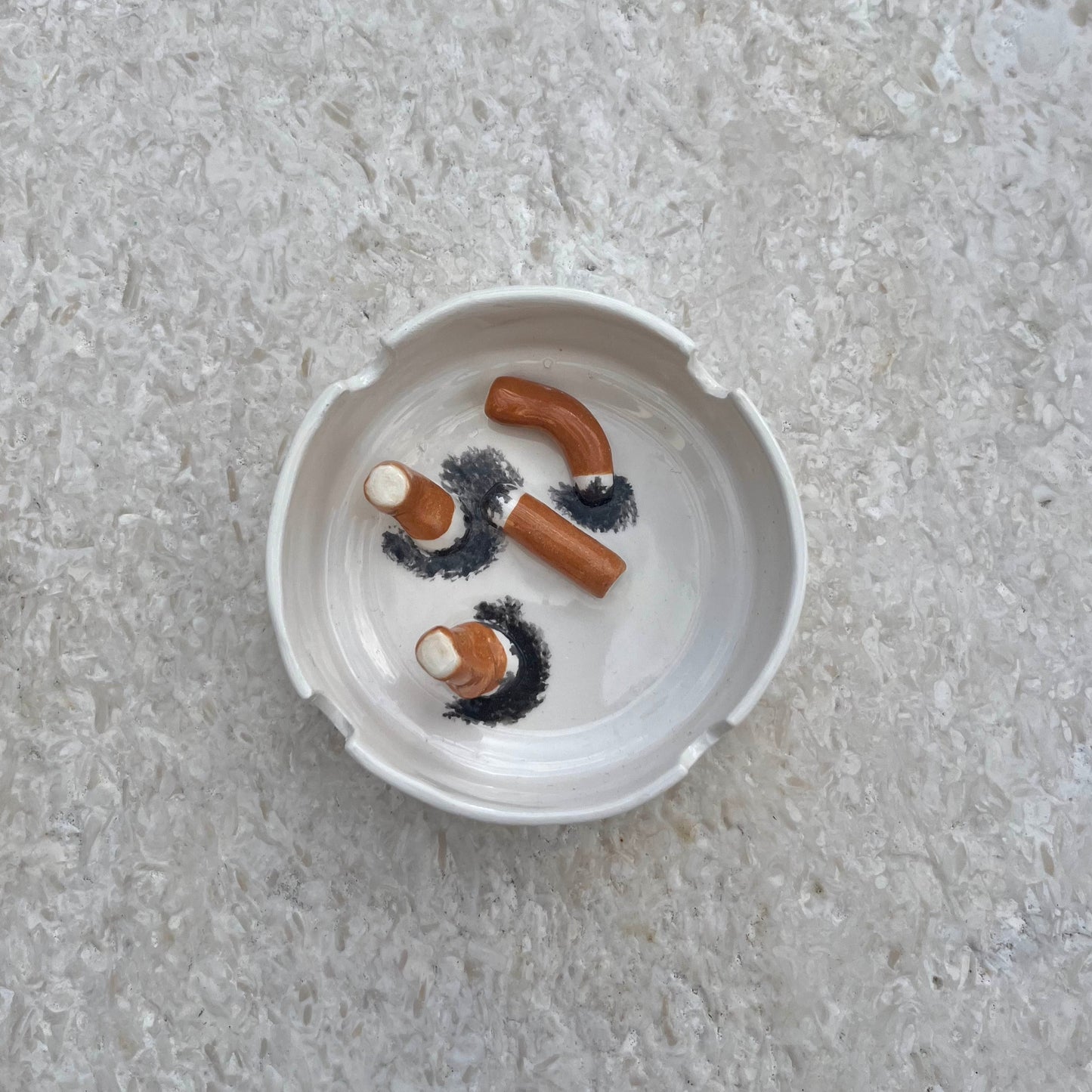 Ashtray/accessory holder full of cigarettes #2