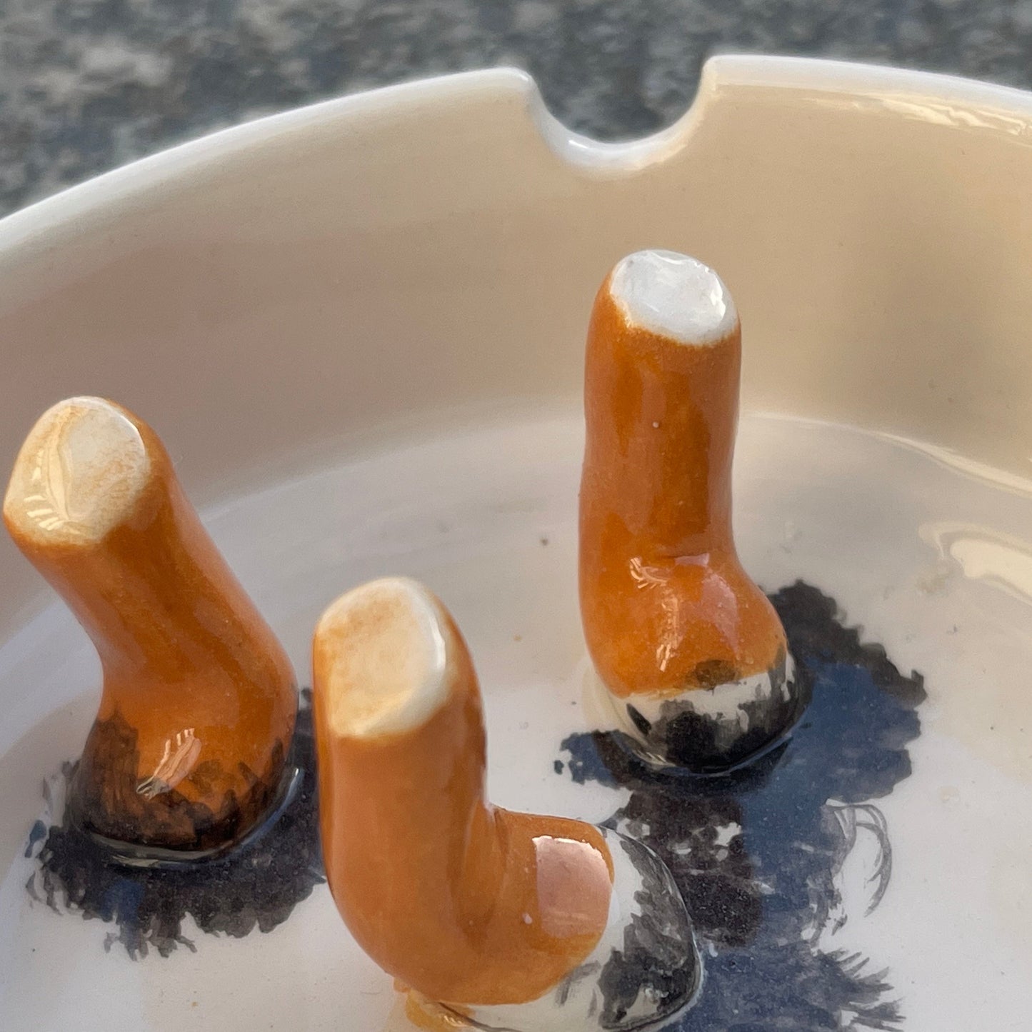 Ashtray/accessory holder full of cigarettes #1