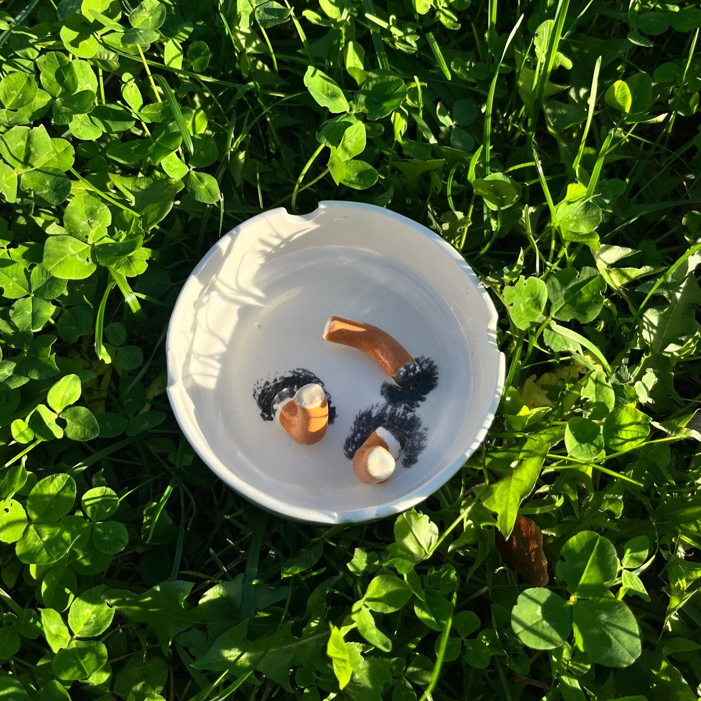 Ashtray/accessory holder full of cigarettes #4