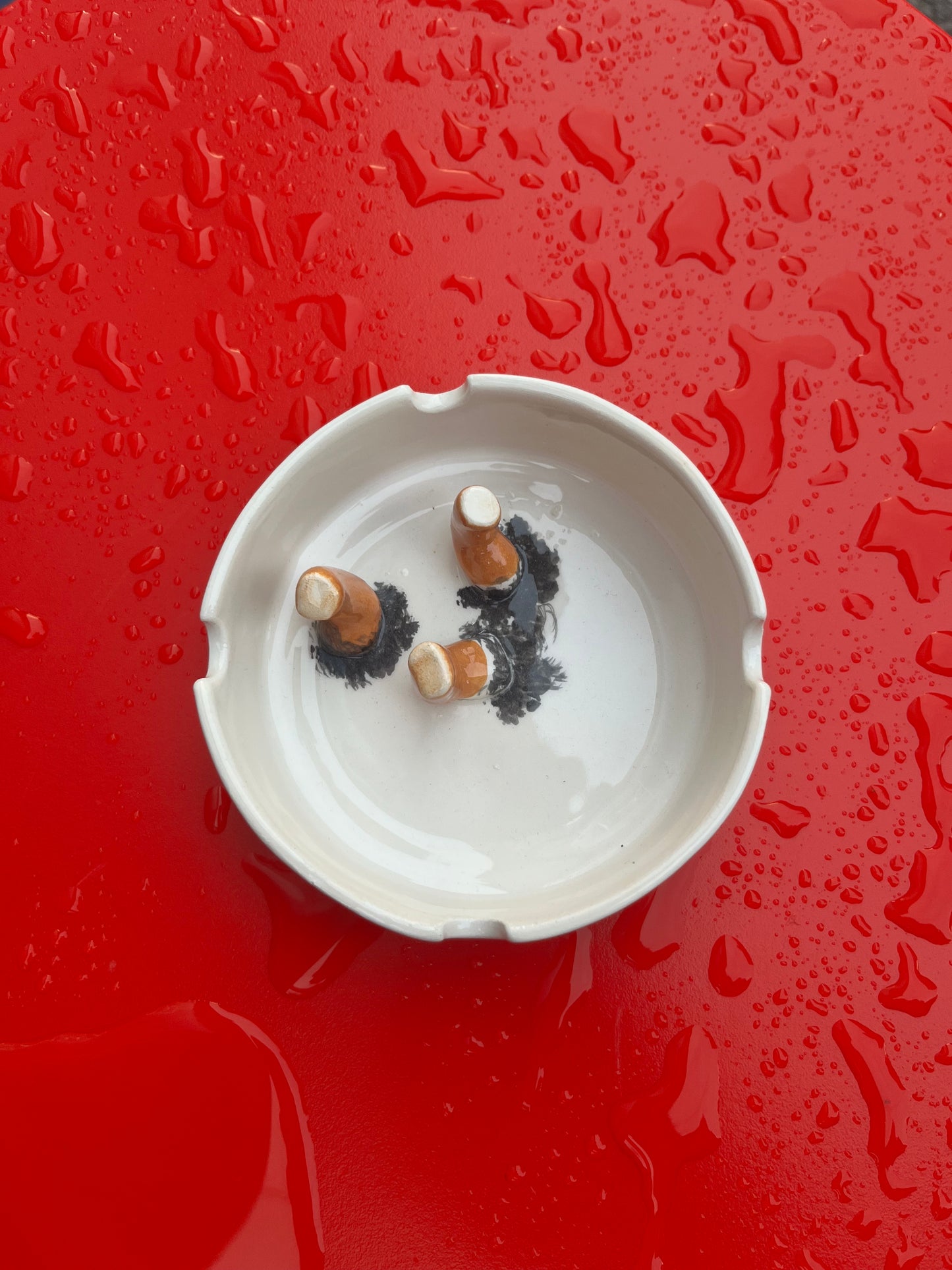 Ashtray/accessory holder full of cigarettes #1