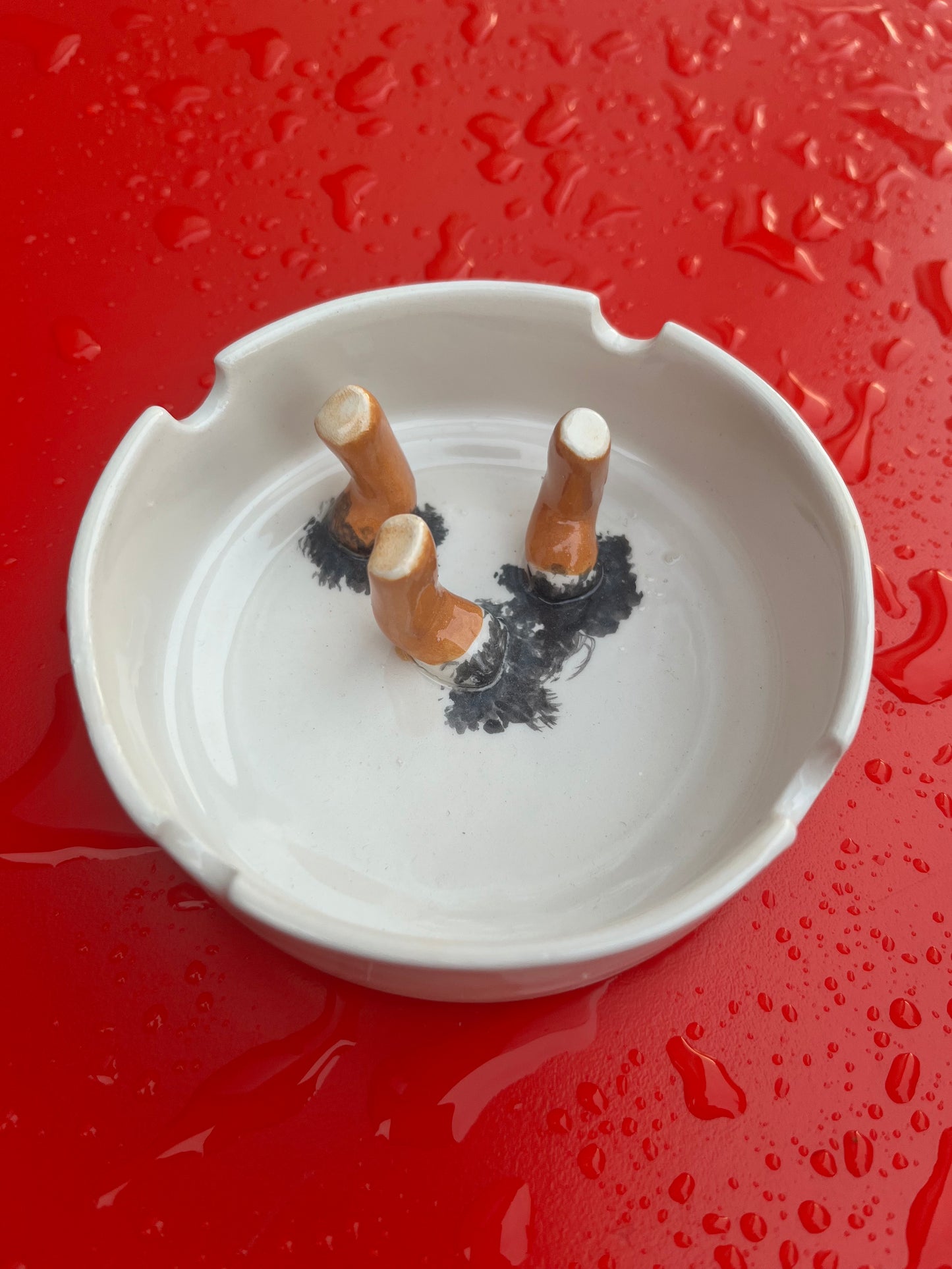 Ashtray/accessory holder full of cigarettes #1